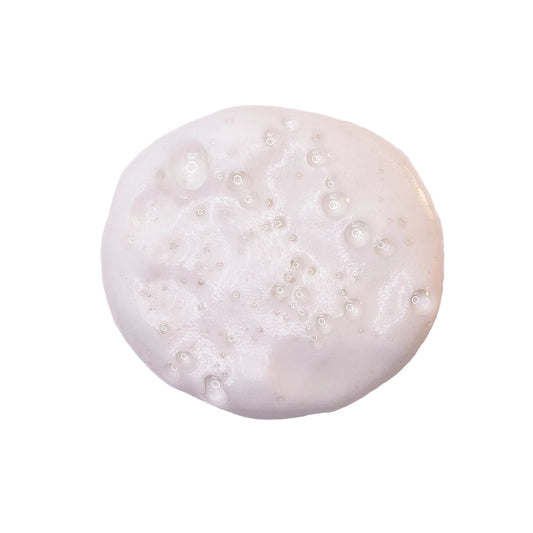 A circle of Fresh Start thick foamy texture on table