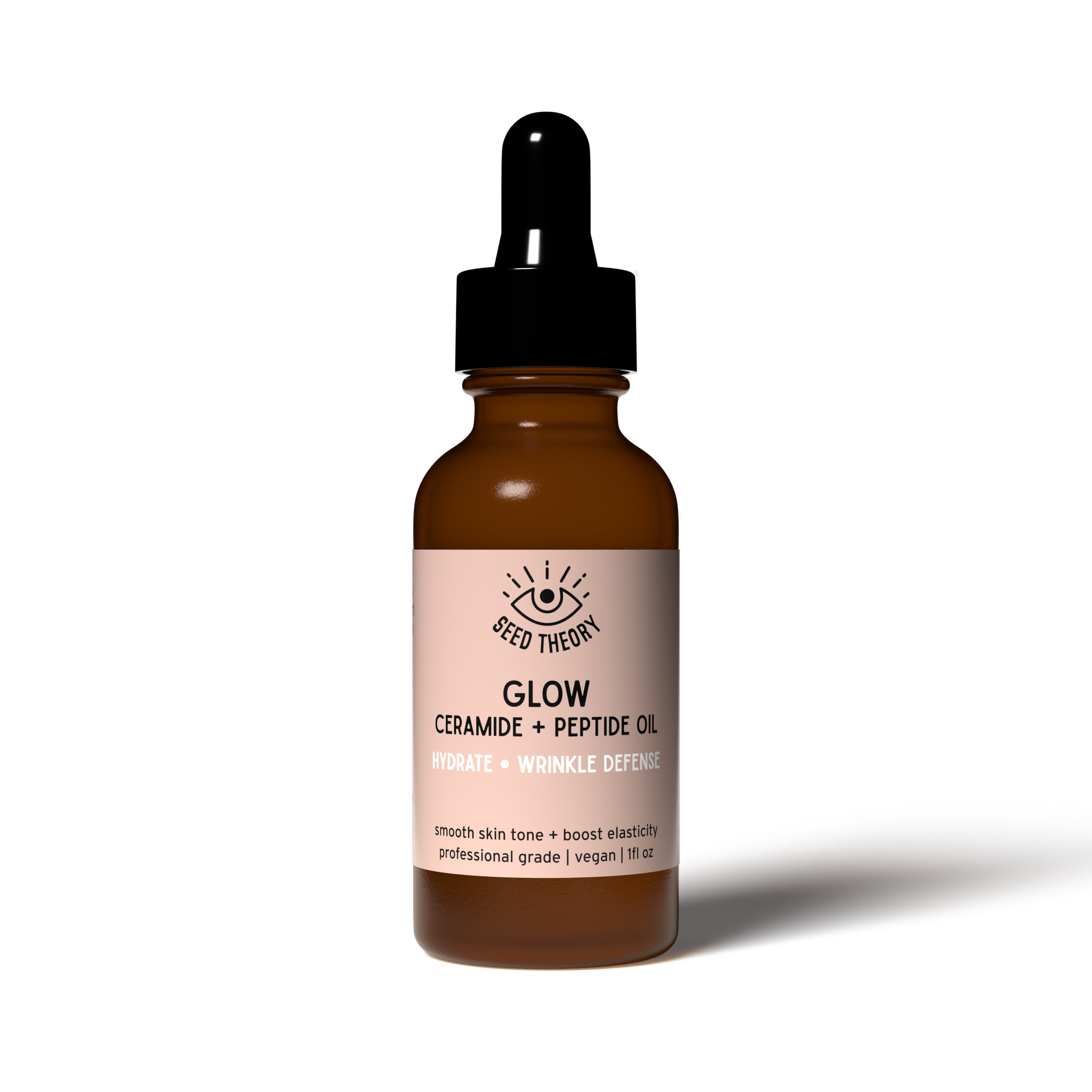 Glow facial oil bottle by Seed Theory. Brown Bottle with Pink Label